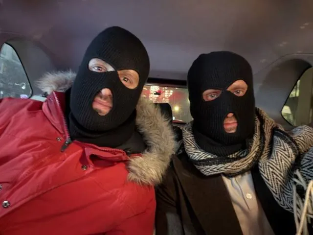 Two of us in black balaclavas in the cold
