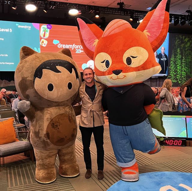 Me at Dreamforce between the Astro and Codey mascots